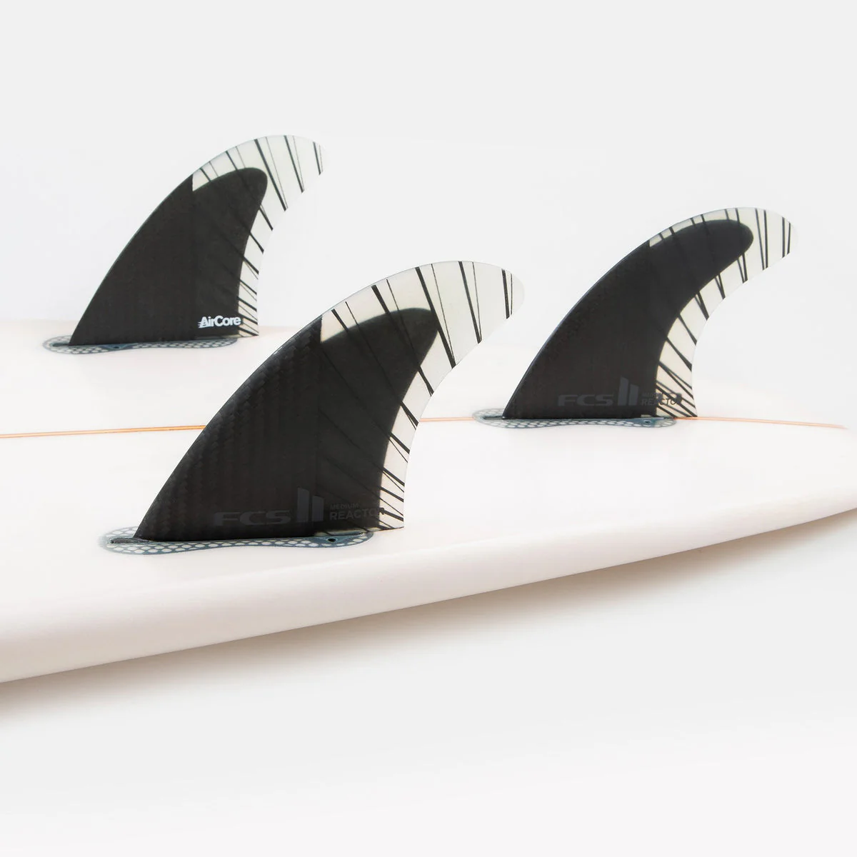 FCS II Large Reactor PCC Carbon + Aircore Thruster Surfboard Fins- Charcoal Black - Image 2